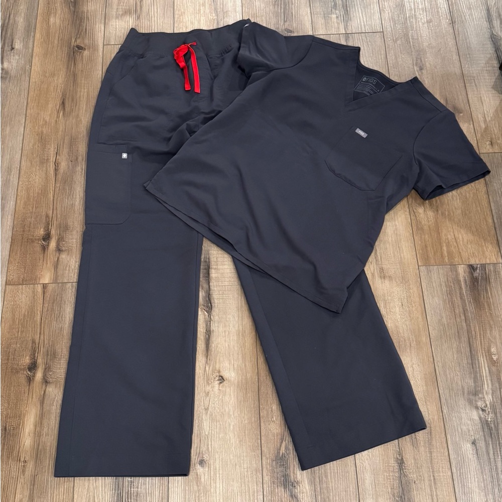Figs Technical Collection Women’s Charcoal Gray scrub set with Red Drawstring.